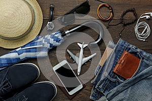 Overhead view of accessories fashion men clothing with technology concept background.