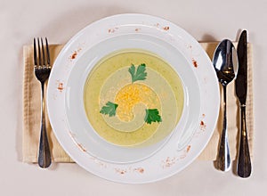 Overhead view of artistically plated soup