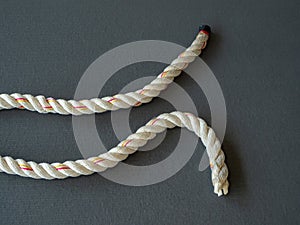 Overhead view of battle ropes sitting on mats