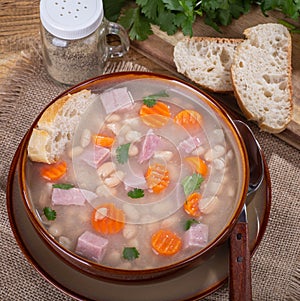 Bowl of Ham and Bean Soup With Carrots