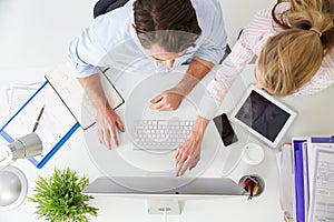 Overhead View Of Businesspeople Working At Office Computerï¿½