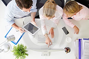 Overhead View Of Businesspeople Working At Office Computerï¿½