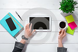 Overhead view of businesswoman working at computer in office