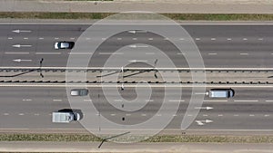 Overhead view of cars moving in both directions on multilane highway