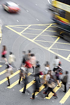 Overhead View Of Commuters Crossing Busy Street