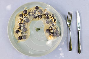 Overhead view of delicious Italian gnocchi with cheese tastefully presented on plate