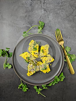 Overhead view of  Dhokla, an Indian Gujarati snack which is vegetarian