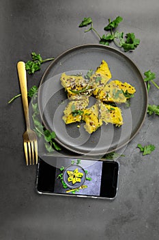 Overhead view of  Dhokla, an Indian Gujarati snack which is vegetarian