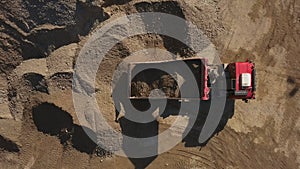 Overhead view of dump truck in open air quarry