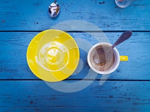 An overhead view of an empty espresso cup