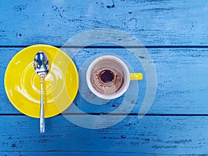 An overhead view of an empty espresso cup