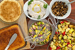 Overhead view of family meal set on picnic table