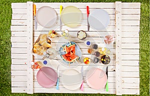 Overhead view of food on a summer picnic table