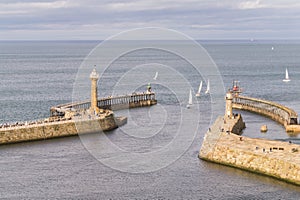 Overhead view of the harbour at Whitby in afternoon sunlight