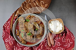 Overhead view of Indian  Goat curry, Mutton curry, Nihari, Rogan Josh in a bowl