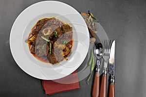 Overhead view of Indian  Goat curry, Mutton curry, Nihari, Rogan Josh in a bowl