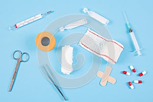 overhead view medical equipments blue backdrop. High quality photo
