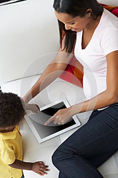 Overhead View Of Mother And Son On Sofa