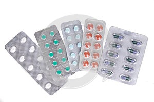 Overhead view of multiple strips of pills tablet, caplet, capsule. Medication for various disease photo