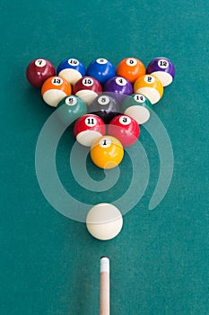 Overhead view of pool billards snooker balls on green table