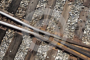 Overhead view of railroad track changeover rails.