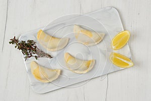 Overhead view of semifinished frozen salmon dumplings