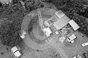 Overhead View Of Shed With Vehicles And Junk