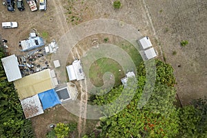 Overhead View Of Shed With Vehicles And Junk