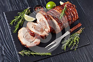 Overhead view of sliced roast pork roulade