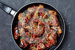 Overhead view of spicy fried chicken wings