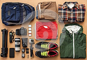 Overhead view of traveler`s accessories, essential vacation items, travel concept background