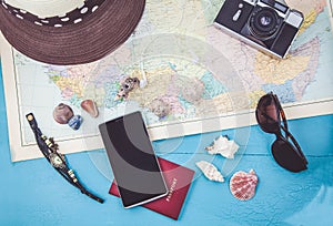 Overhead view of Traveler`s accessories Travel plan, trip vacation, tourism mockup Instagram looking image of travelling concept