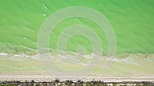 Overhead view of unusual green waves of Caribbean sea