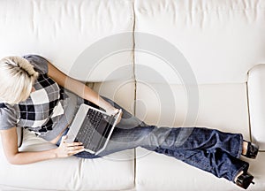 Overhead View of Woman on Couch With Laptop