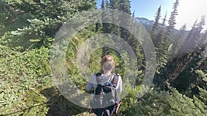 Overhead of Woman Walking in Alpine Territory