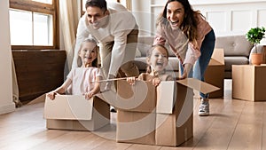 Overjoyed family have fun on moving day