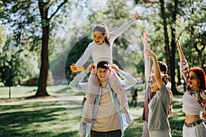 Overjoyed friends enjoying a sunny day in the park, taking a selfie to capture the moment