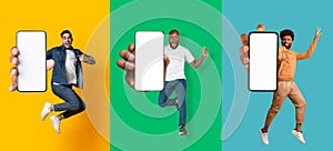 Overjoyed multiracial young guys jumping up in air, showing smartphones with mockup, banner design. Collage