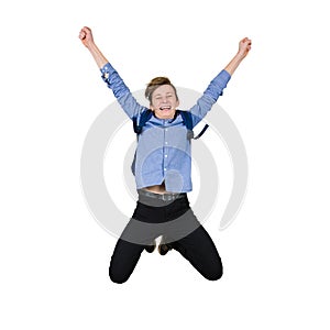 Overjoyed teenage guy jumping high in the air, hands raised up, gesturing happiness isolated on white. Excited boy celebrate the