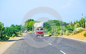 Overland bus at the Jodhpur Highway in Rajasthan, India