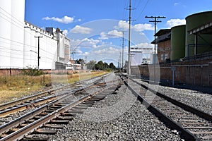 Overland view of the crossing of the train tracks on Inglaterra avenue photo