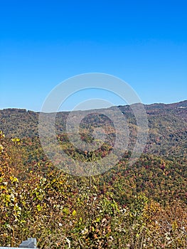 An overlook on the Blue Ridge Parkway in Boone, NC during the autumn fall color changing season