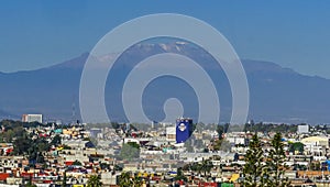 Overlook Buildings Snow Capped Mount Iztaccihuatl Puebla Mexico photo