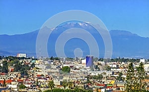 Overlook Buildings Snow Capped Mount Iztaccihuatl Puebla Mexico photo