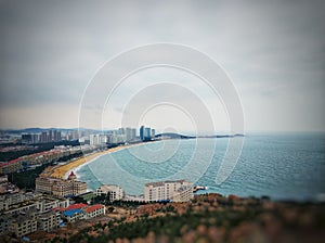 Overlook the city from the mountain beside sea