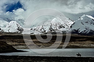 Overlooking the 7,500-meter-high Muztagh Tower from Pamirs Karakul Lake