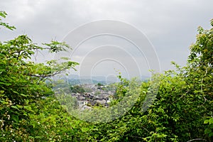 Overlooking ancient Qingyan town from hilltop in cloudy spring