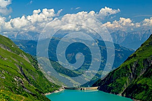 Overlooking the Dam of the Wasserfallboden and the Schmittenhohe Mountain Ridge photo