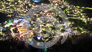 Overlooking the lively and colorful valley villages at night. Jiufen, Taiwan.