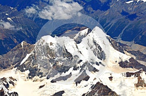 Overlooking the snow-capped mountains photo